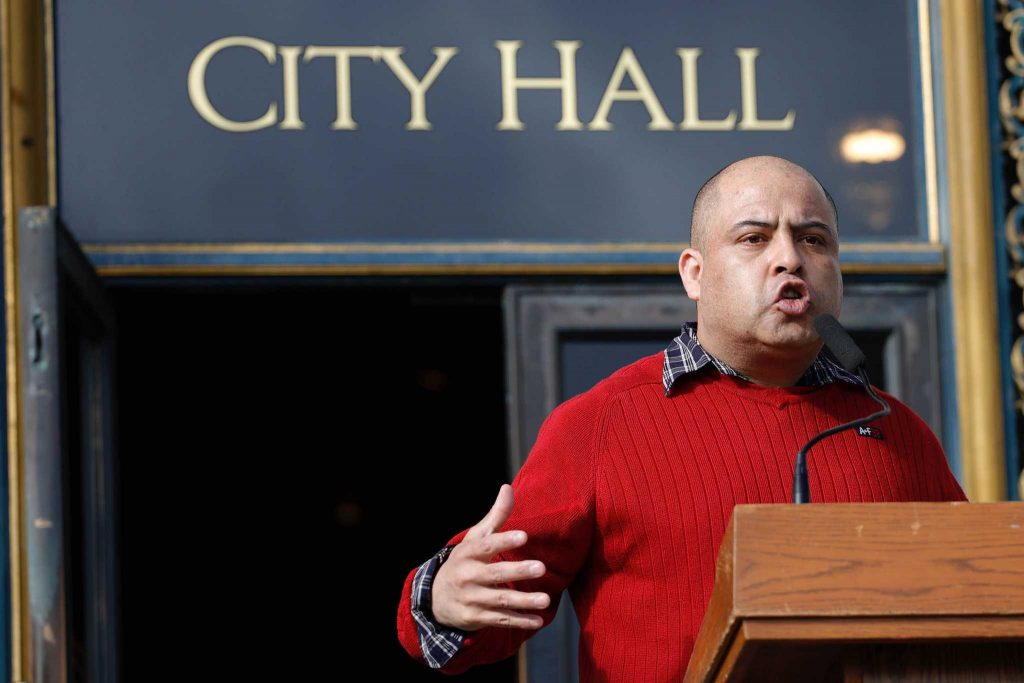 Joaquin Sotelo shares his story and experiences as an immigrant at the immigrants right rally at City Hall on Thursday, Feb. 16, 2017. (Mason Rockfellow/Xpress)