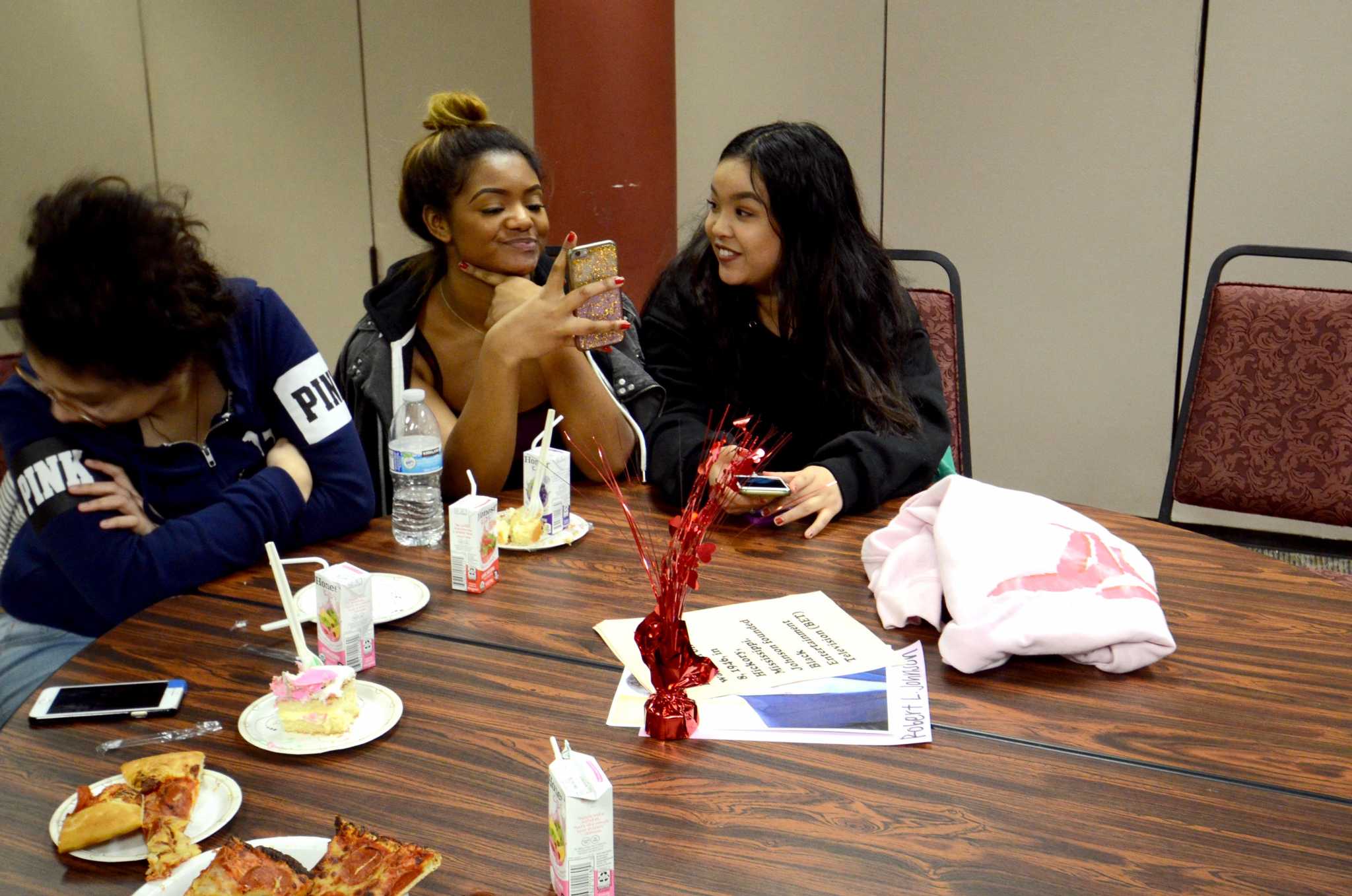 SF State students chat with friends at the Black History Month celebration held in the campuss Towers at Centennial Square on February 13, 2017. (Tate Drucker/Xpress)