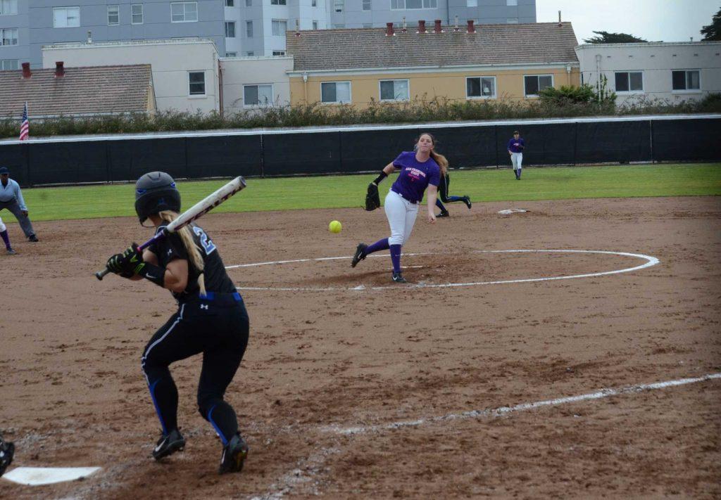 Megan Clark pitching during a game against the California State University San Marcos Cougars on Mar. 10, 2017, at San Francisco State University. San Francisco State won the game 6-1. (Christianna Fjelstad/ Xpress)