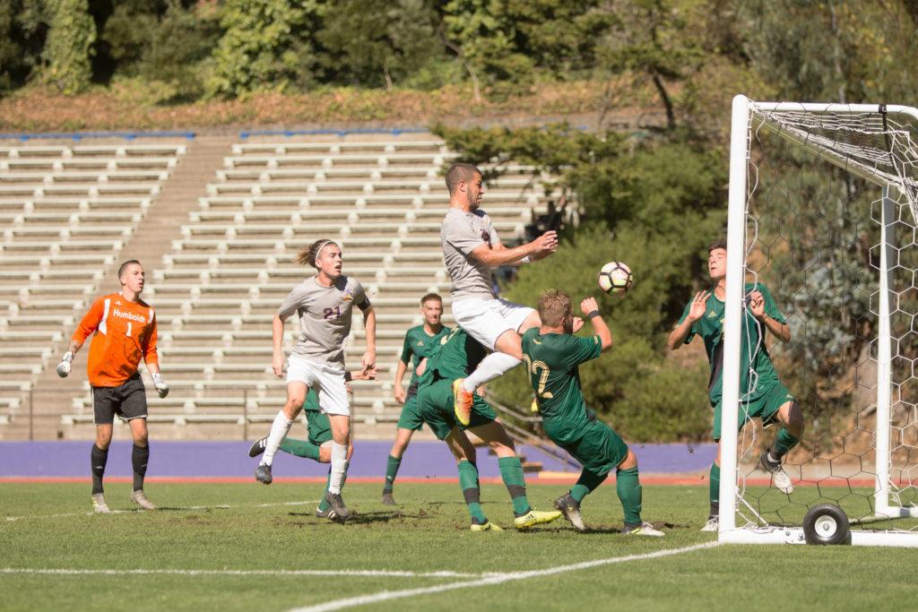 Tariq Pulskamp (#19) heads the ball into the goal against Humboldt State at Cox Stadium in San Francisco on Wednesday, October 25, 2017. Pulskamp scored his 5th goal of the season. (Mitchell Mylius/Golden Gate Xpress)