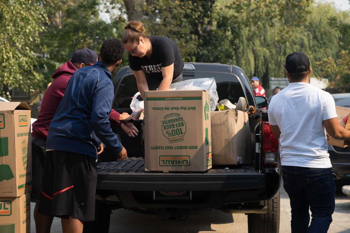 A volunteer group called the “Street Soldiers” gather donations for fire evacuees in Santa Rosa on Friday, Oct. 13, 2017. (Sarahbeth Maney/Golden Gate Xpress)