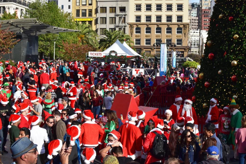 At+least+200+hundred+people+dressed+as+Santa+Claus+gather+for+SantaCon+2017+at+Union+Square+in+San+Francisco%2C+Saturday%2C+Dec.+9%2C+2017.+%28Garrett+Bergthold%2FGolden+Gate+Xpress%29