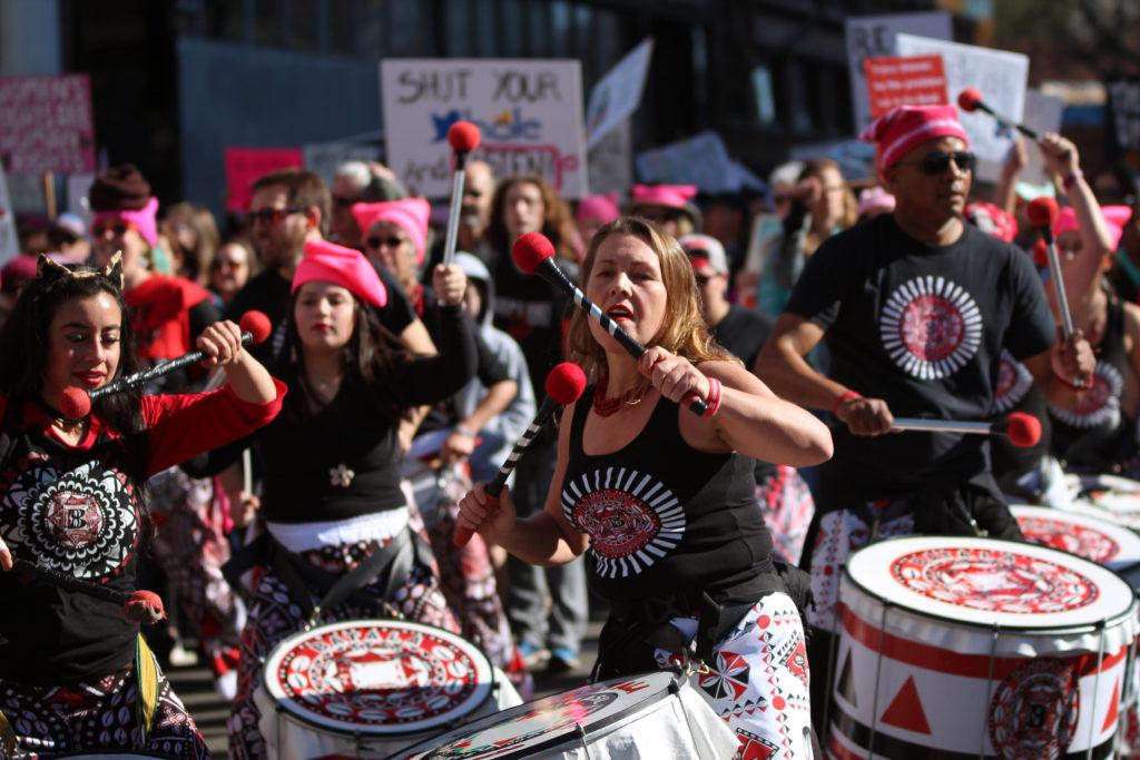 Batalá San Francisco members perform samba-style percussion and dance during the Womens March in Oakland, Calif., on Saturday, Jan. 20, 2018.(Golden Gate Xpress/ Christian Urrutia)