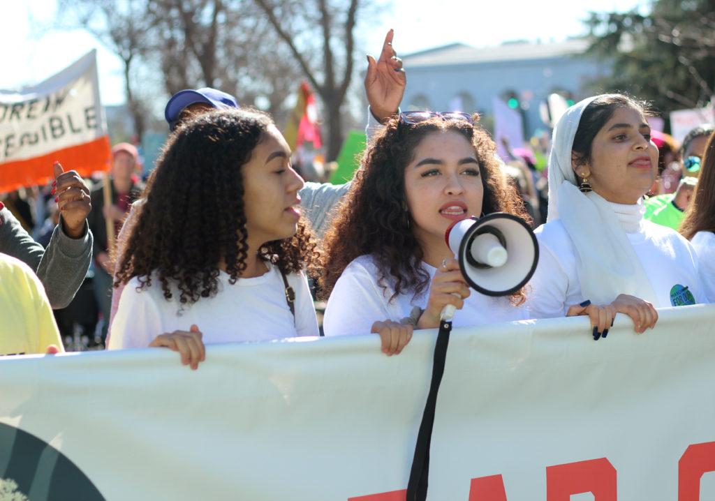 Laila Schmedel, (center), March for Our Future member and Las Positas College student speaks during the Womens March in Oakland, Calif., on Saturday, Jan. 20, 2018.March for Our Future is a youth-based group encouraging the youth to get involved politically and socially.(Golden Gate Xpress/ Christian Urrutia)