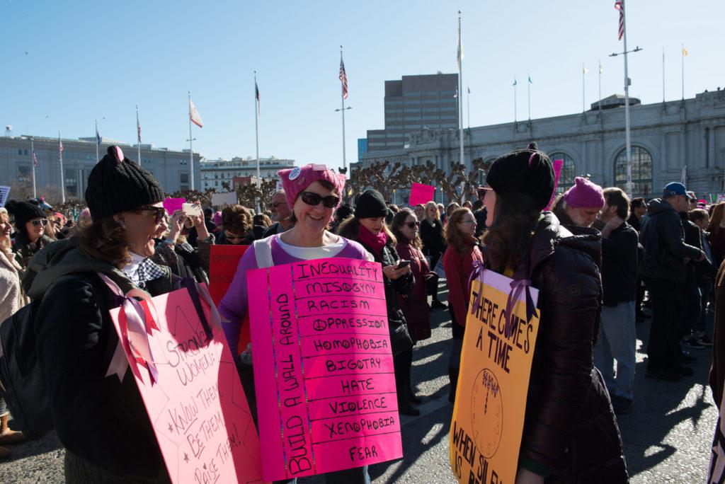 Participants of Women's March look over each other's signs in San Francisco, Saturday, Jan. 20, 2018.
This year was the second year San Francisco hosted a Women's March. Last year's was started because of the inauguration of President Donald Trump and continues this year because of the empowerment and influence it brought to those that attended.(Golden Gate Xpress/ David Rodriguez)