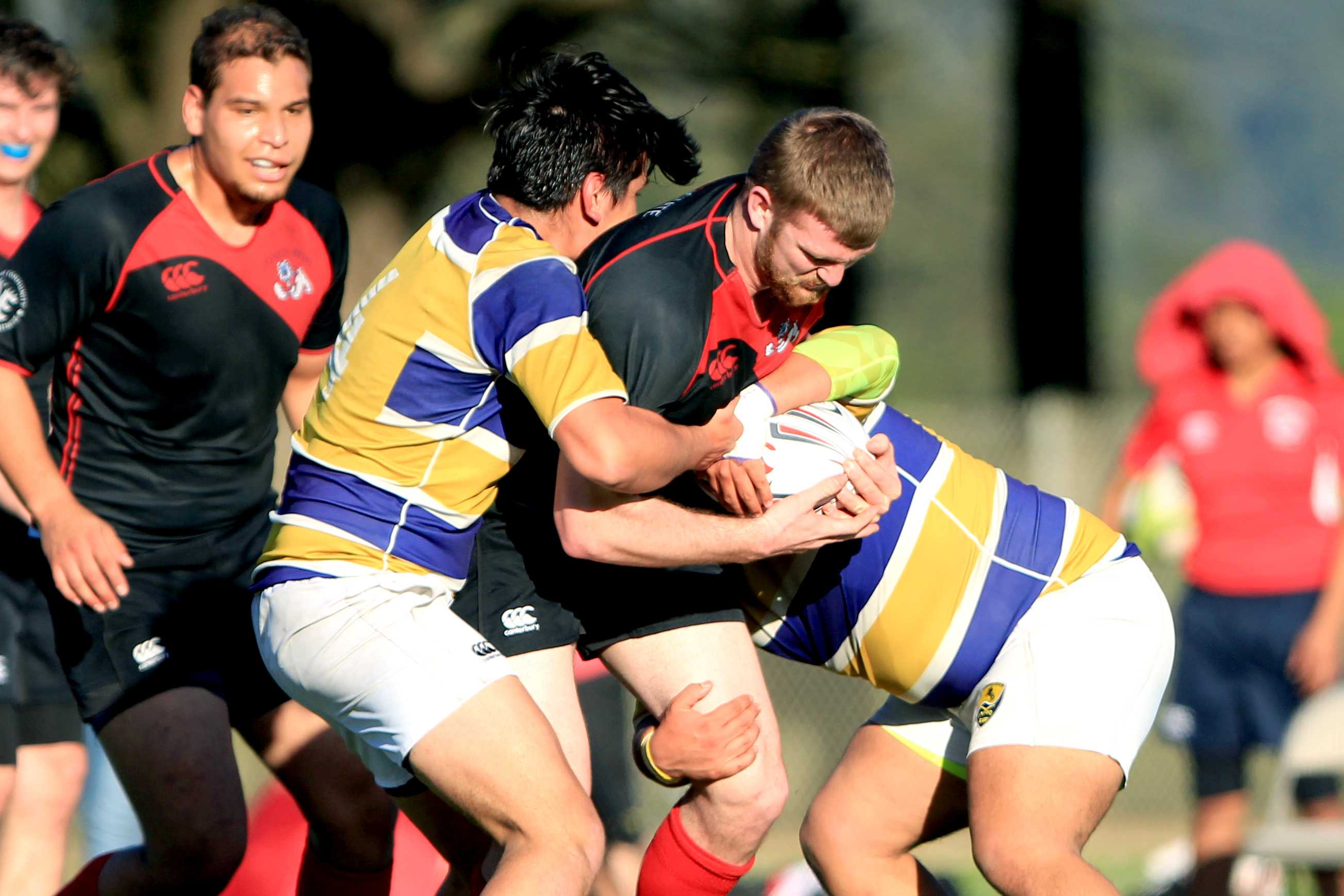 Fresno State lock Antonio Guerra (5) tries to escape a tackle during a rugby match against SF State at Gellert Field in Daly City, Calif., on Saturday, Feb. 3, 2018. (Christian Urrutia/Golden Gate Xpress)