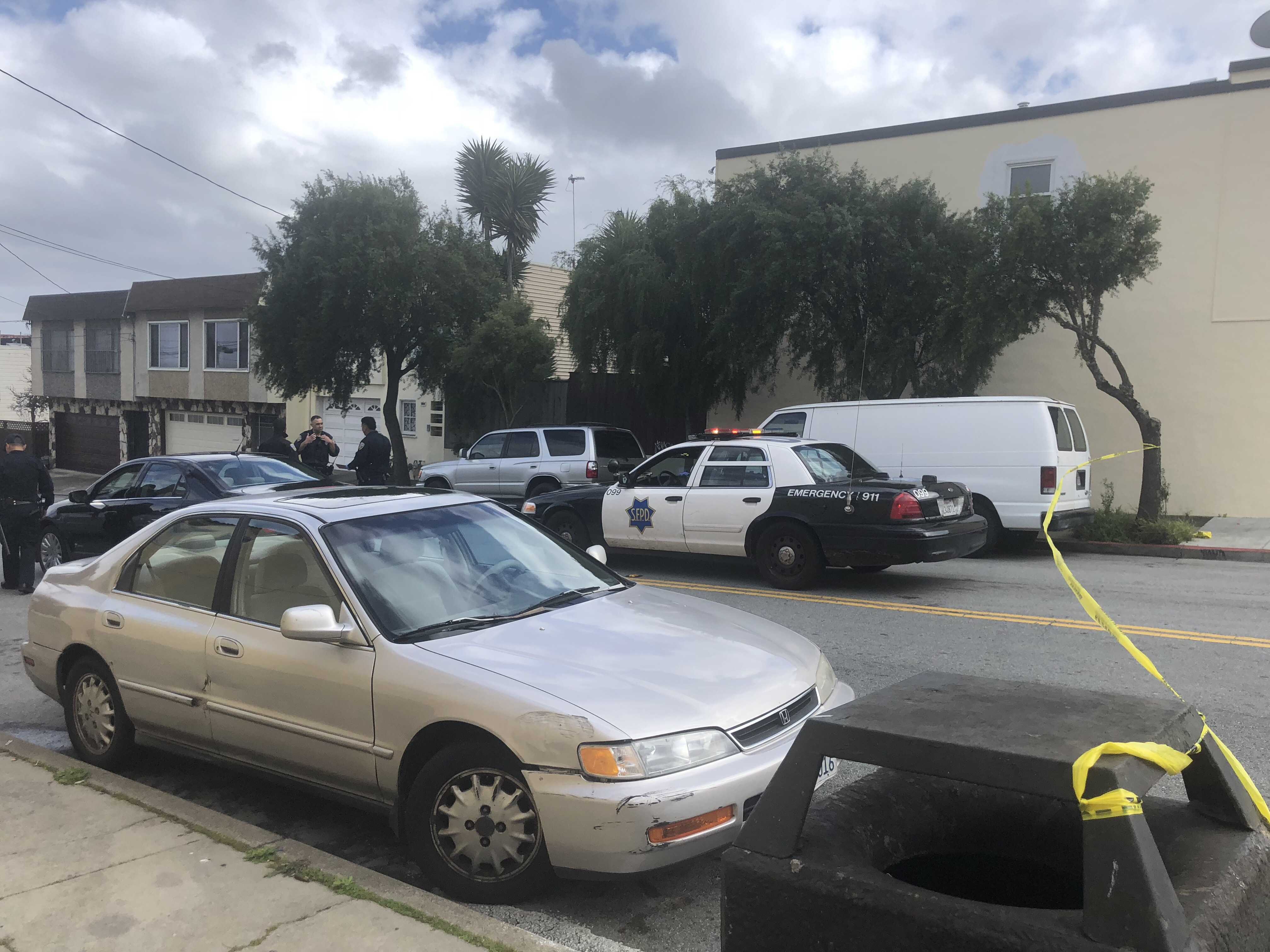 Police block off the scene of a drive by shooting near the intersection of Madison and Felton streets Thursday, March 1, in San Francisco. (Lea Loeb/Golden Gate Xpress)