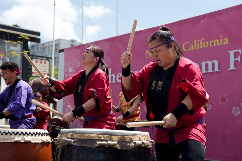 Jennifer Fong, left, perform along side her sister Michelle Fong and other members of the San Francisco Taiko dojo at the 2018 Northern California Cherry Blossom in San Francisco on Saturday, Apr. 15, 2010. (David Rodriguez/Golden Gate Xpress)