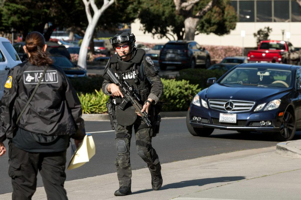 Armed officers present after the shooting incident at YouTube headquarters in San Bruno, Calif. (Photo by Garrick Wong)