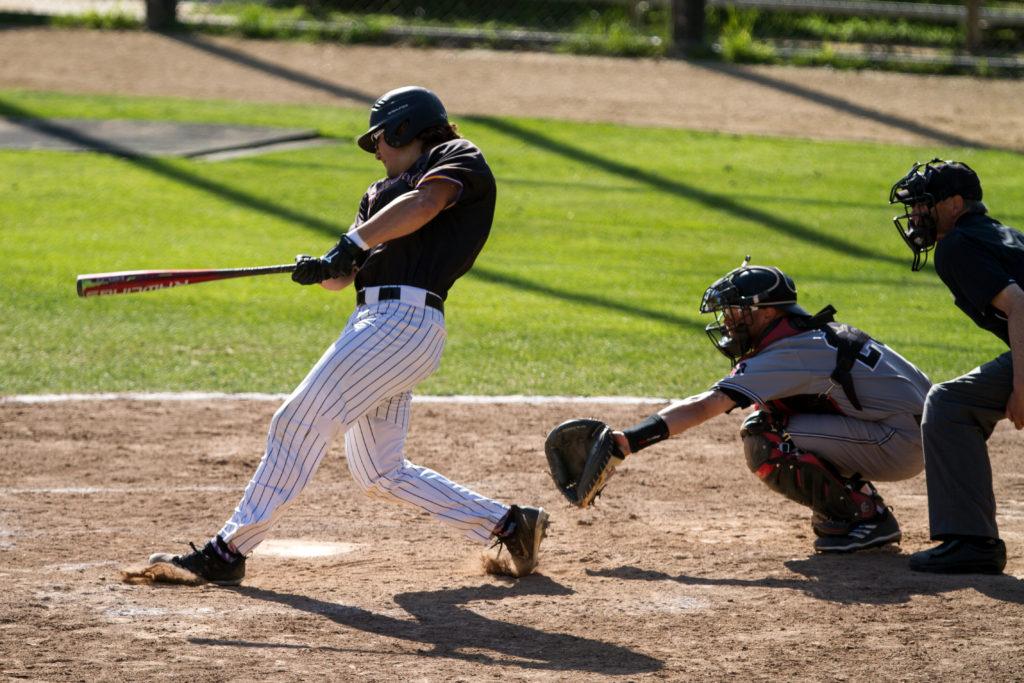 SF State outfielder Jack Harris (11) gets a hit against Holy Names University at Maloney Field at SF State on Monday, April 2, 2018.