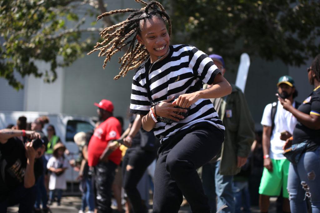 Mucho Banksy dances while listening to Young Bari at the Imperium Stage during Hiero Day 2018 in Oakland, Calif., on Monday, Sept. 3, 2018. (Christian Urrutia/Golden Gate Xpress)