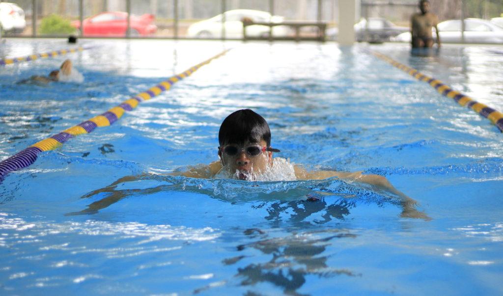 Jia Nan Mai swim laps in the pool at the Mashouf Wellness Center in between classes at SF State on Friday, Sept. 7. (Lindsey Moore/Golden Gate Xpress)