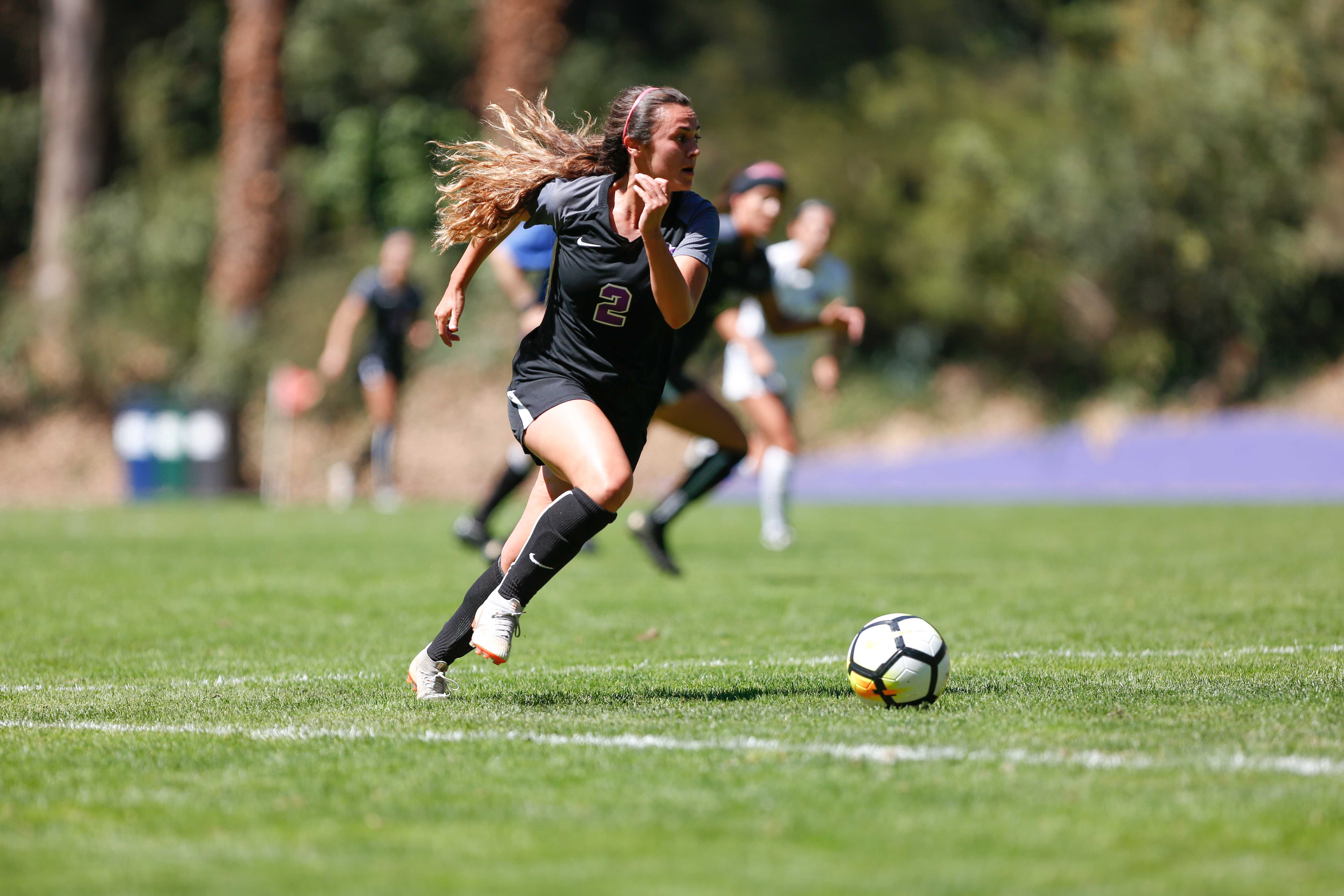 SF State midfielder Ana Williams races upfield after the opening kick off during the womens soccer home opener against Seattle Pacific on Saturday Sept. 8, 2018. (Niko LaBarbera/Golden Gate Xpress)