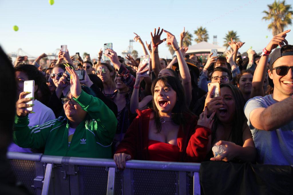 A crowd cheers as artist Anim performs on stage at the Treasure Island Music Festival at Middle Harbor Shoreline Park in Oakland, Calif., on October 13, 2018. (Janett Perez/Golden Gate Xpress)