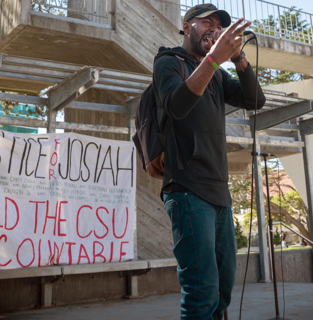 SF State Africana studies and BECA major, Damion Square, 28, speaks at the protest for the murder of Humboldt State student, David Josiah Lawson, on Monday, Oct. 15, 2018.