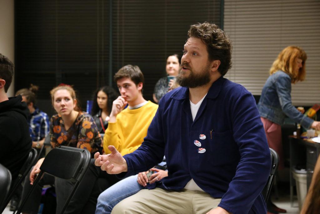 Alexander Otruba contributes to a political discussion during a Midterm Election watch party hosted by SF States political science department held in the Humanities Building on Tuesday, Nov. 6, 2018. (Mira Laing/Golden Gate Xpress)