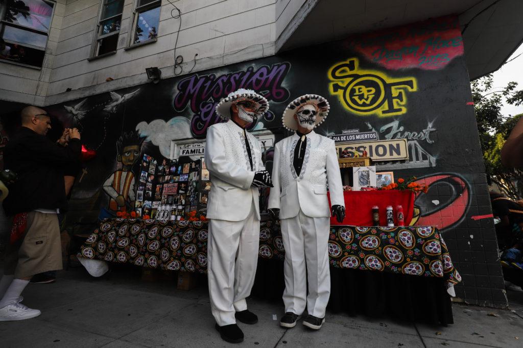David Bjorklund and Ron Hoover participate in the Dia de los Muertos celebration in the Mission District of San Francisco, Calif. on November 2, 2018. (J335 / Camille Cohen)