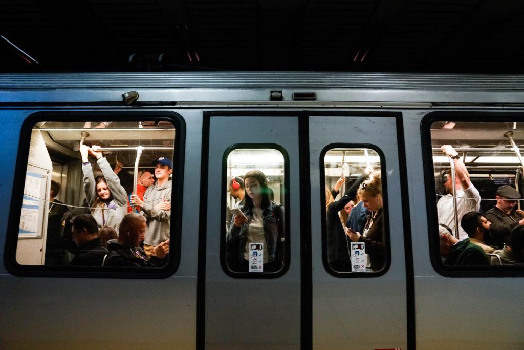 Muni M line passengers cram into the train going outbound towards SF State from the Castro Street station. (Amarah Hernandez/Golden Gate Xpress)