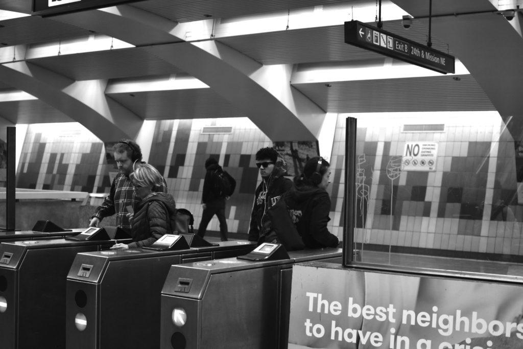 People enter the 24th Mission Street BART station using their Clipper cards on Saturday, Jan. 26 in San Francisco.