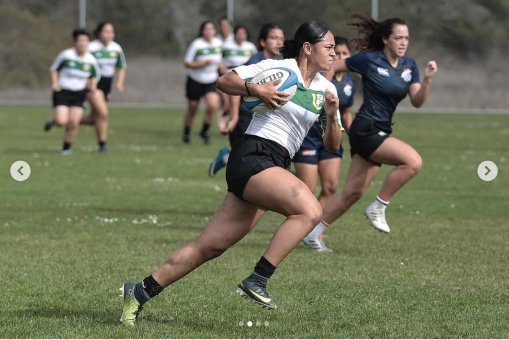 Fia Tautolo, rugby player and SF State student, sprints from defenders in a game on Oct. 29, 2019.(Special to Golden Gate Xpress/Lizeth Lafferty)