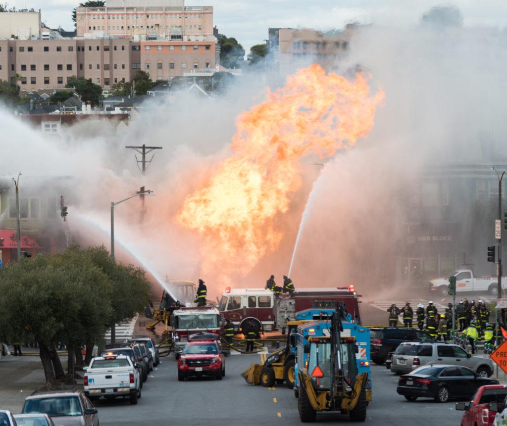 Flames engulf a building near the intersection of Geary Boulevard and Parker Avenue in the Inner Richmond district of San Francisco, Calif., on Wednesday, Feb. 6, 2019.