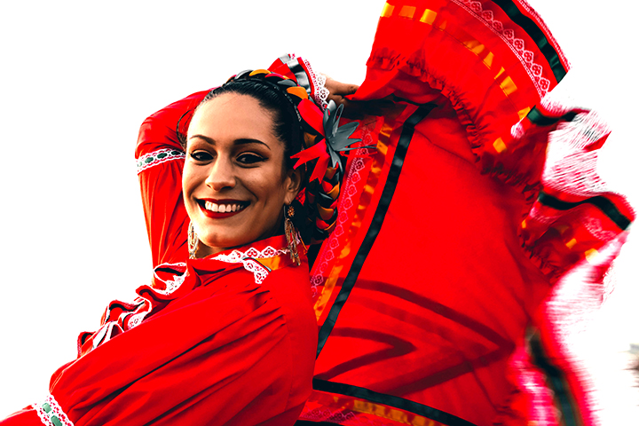 Rebeca Gonzales Estrada spins while practicing a traditional dance from Sinaloa
Mexico. She and others are practicing in order to perform during Hispanic Heritage
Month. Practice took place at Ocean Beach on September 26, 2019. (Photo by William
Wendelman / Golden Gate Xpress)
