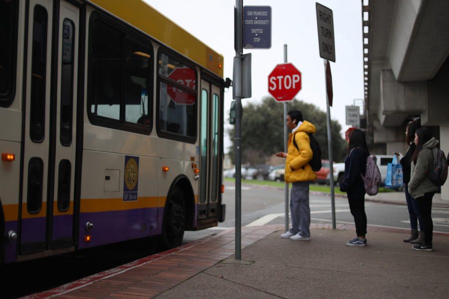 People wait in line to board the San Francisco State University shuttle bus at the Daly City Bart Station in Daly City Calif., on Monday January 27, 2020. (Emily Curiel/Golden Gate Xpress)