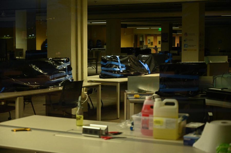 Computers at the study commons inside the J. Paul Leonard Library at SF State are covered and taped with black trash bags to protect them from contamination on Aug. 25, 2020 in San Francisco. (Dyanna Calvario/ Golden Gate Xpress)