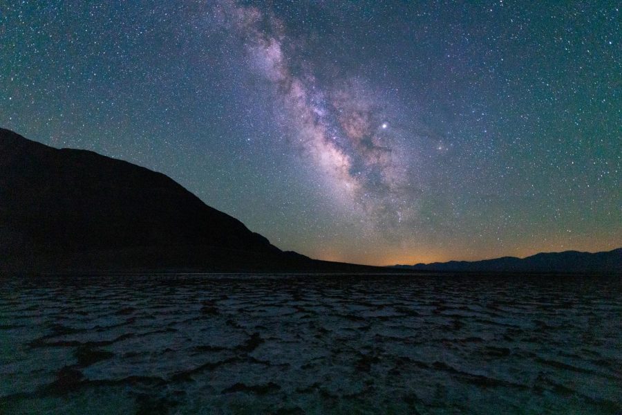The core of the Milky Way and Jupiter (brightest star to the right of core) shines over the Badwater Basin in Death Valley National Park, Calif. on June 1, 2019. (Jun Ueda / Golden Gate Xpress)