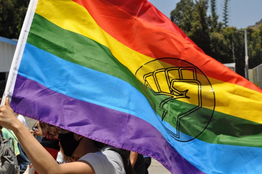 The pride flag with the Black Power emblem is flown at the All Black Lives Matter march in Los Angeles in June 2020. At least 30,00 people, reported by NBC Los Angeles, were in attendance. (Chris Ramirez / Golden Gate Xpress)

