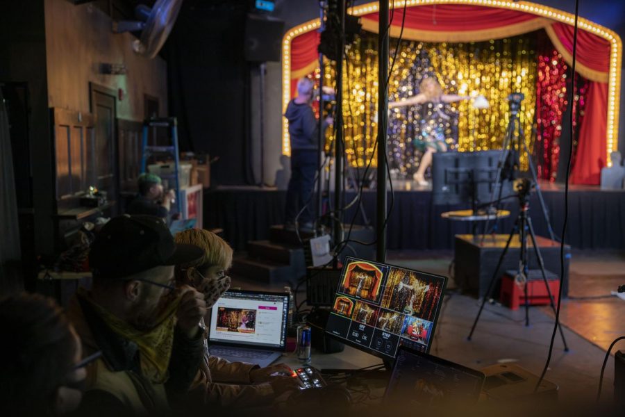 Producers sit behind a desk as they monitor the show for online viewers. Oasis produced a telethon on Saturday March 6, 2021 from 12PM –12AM to help the club from closing down. (Emily Curiel / Golden Gate Xpress)