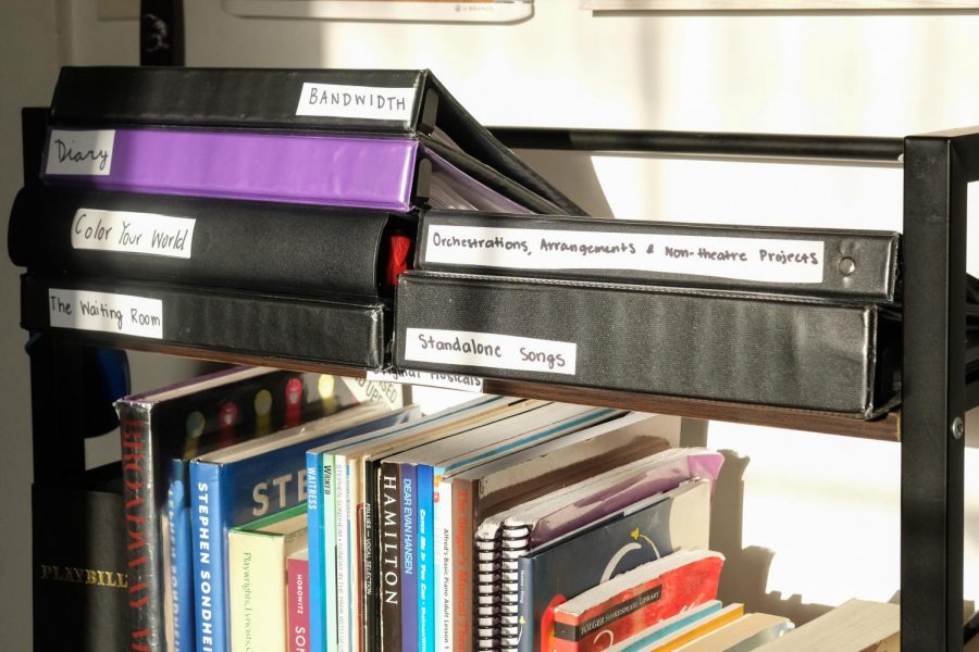 A storage shelf in Christian Cantrell’s room with various musicals on March 14. Cantrell is a lyricist and composer in the SF State Drama Department. (Avery Wilcox / Golden Gate Xpress)
