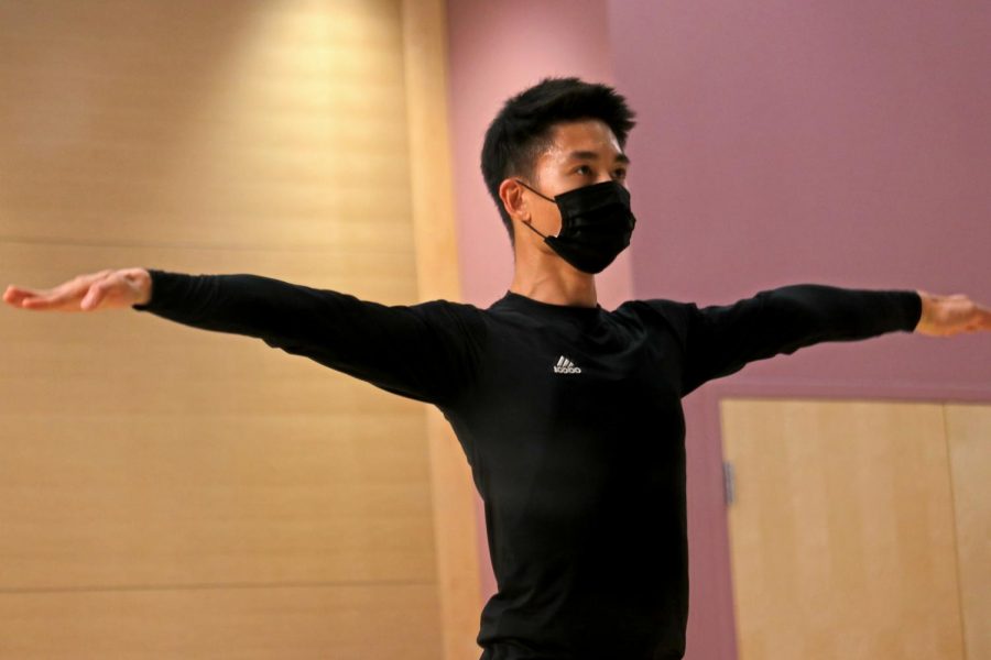 Lam Nguyen, 26, practices in Little Theater at SF State on Aug. 31, 2021. Him and his wife, Yasmine Nguyen, had to share their living room for performing, practicing and attending Zoom classes, which wasn’t suitable for them. 