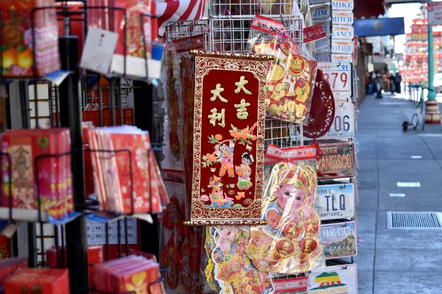 Lunar New Year decorations hang at the entrance of a store front in Chinatown on Feb. 1, 2022. (Karina Patel / Golden Gate Xpress)