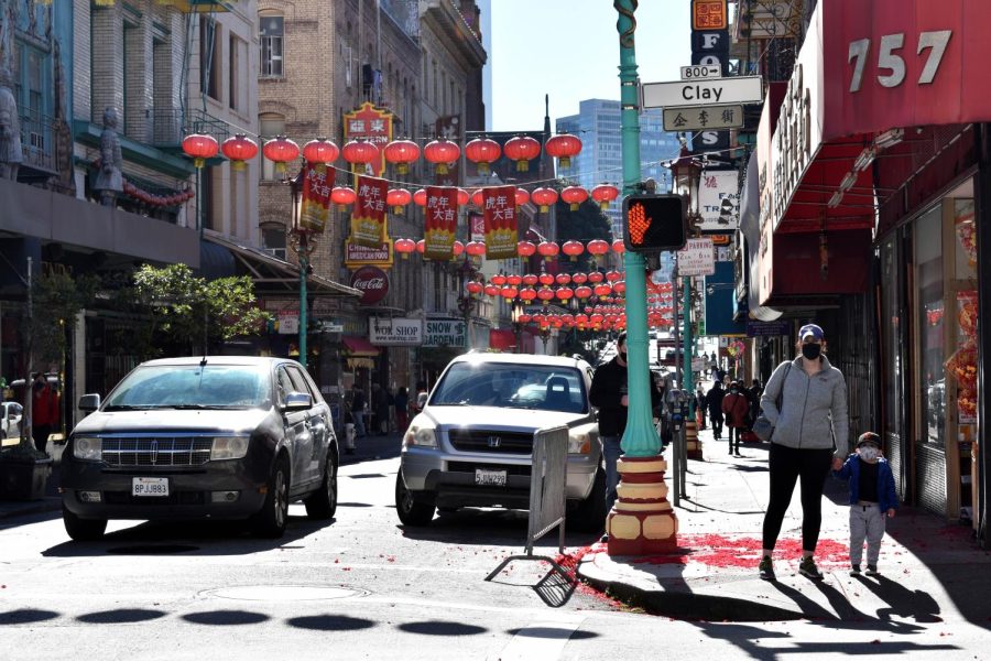 Lunar New Year decorations hang off a store front in Chinatown on Feb. 1, 2022. (Karina Patel / Golden Gate Xpress)