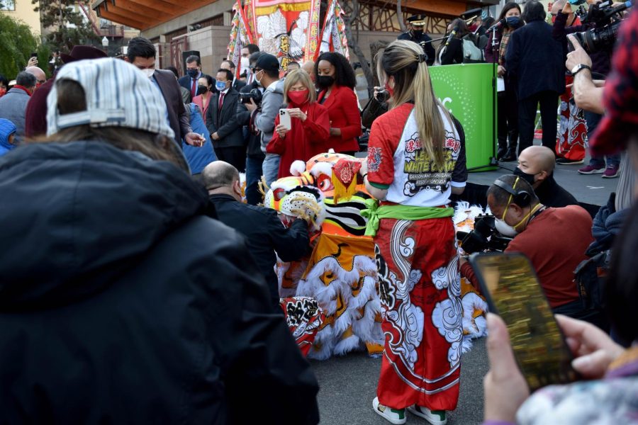 Leungs White Crane Dragon & Lion Dance Association finishes their lion dance perfomance at Portsmouth Square in Chinatown on Feb. 1, 2022. (Karina Patel / Golden Gate Xpress)