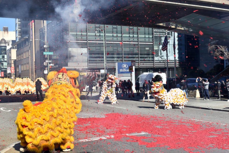 The traditional Dragon Dance is performed under the bridge that leads up to the Chinese Culture Center on Kearny Street in Chinatown on Feb. 1, 2022. (Karina Patel / Golden Gate Xpress)