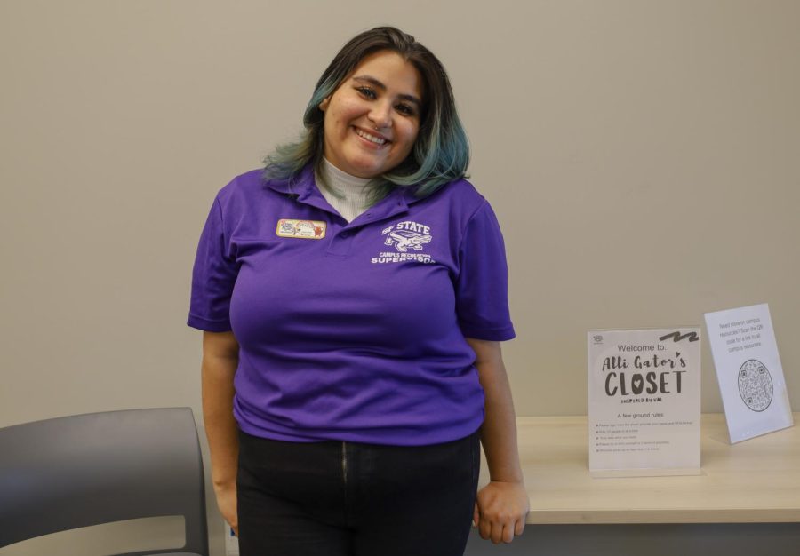 SF State Student Valeria Rodriguez poses while hosting Alli Gators Closet, an event created by Rodriquez to provide clothing to students at SF State that are in need of it in the Mashouf Wellness Center on Apr. 6, 2022. (Bianca Heredia / Golden Gate Xpress)