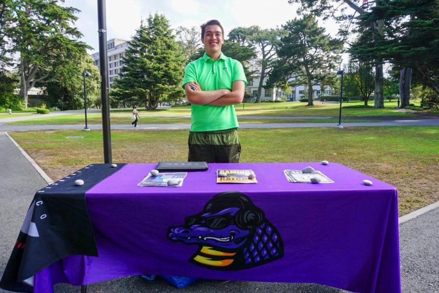 Ryan Winter, president of SF State’s Gaming Gators, tables in front of the Cesar Chavez Student Center on Aug. 30. Winter spread the word about the gaming club and the new video game minor being offered during Welcome Week. (Tatyana Ekmekjian / Golden Gate Xpress).
