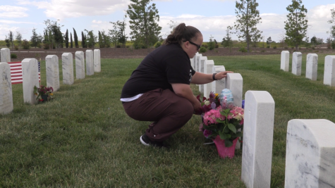 Ashley Vind visits her deceased parents at the Sacramento National Cemetery on mothers day on Sunday, May 14, 2022. (Myron Caringal / Golden Gate Xpress)
