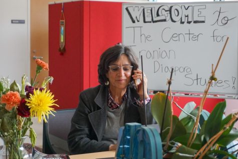 Persis Karim, chair of SF States Center for Iranian Diaspora Studies, makes phone calls at the Center in the Humanities Building at SF State on Oct. 5, 2022. Karim has been working to educate students and bring awareness to the unfortunate events taking place in Iran. (Tatyana Ekmekjian / Golden Gate Xpress) 