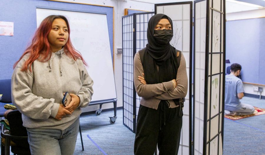 Ruqaiyah Angeles (left) and Khadeejah Dos (right) stand in the Prayer and Reflection Room in the Cesar Chavez Student Center during an interview with Golden Gate Xpress on Sept. 28, 2022. (Juliana Yamada / Golden Gate Xpress)