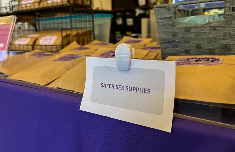 Condom kits lay on a table inside the Health Promotion & Wellness office at SF State on Nov. 14, 2022. HPW provides kits for students to pick up, which include condoms as well as lube. (Ashley Hayes-Stone / Golden Gate Xpress) 