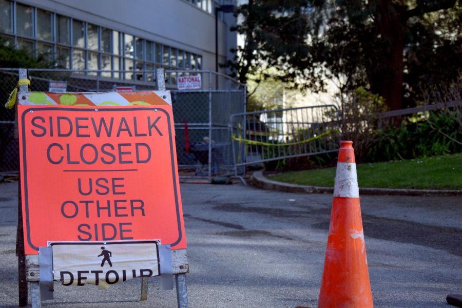 Maintenance in front of the Student Health Center blocks the pathway causing students to walk around at SF State, Wednesday, Feb. 8, 2023. (Chris Myers / Golden Gate Xpress) 
