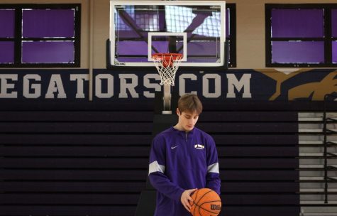 Alex Gilat, member of the men’s basketball team and recipient of the College Sports Communicators Academic All-District honors award, poses for a portrait inside SF State’s Don Naser Gym on Monday March 6, 2023 (Leilani Xicotencatl / Golden Gate Xpress)