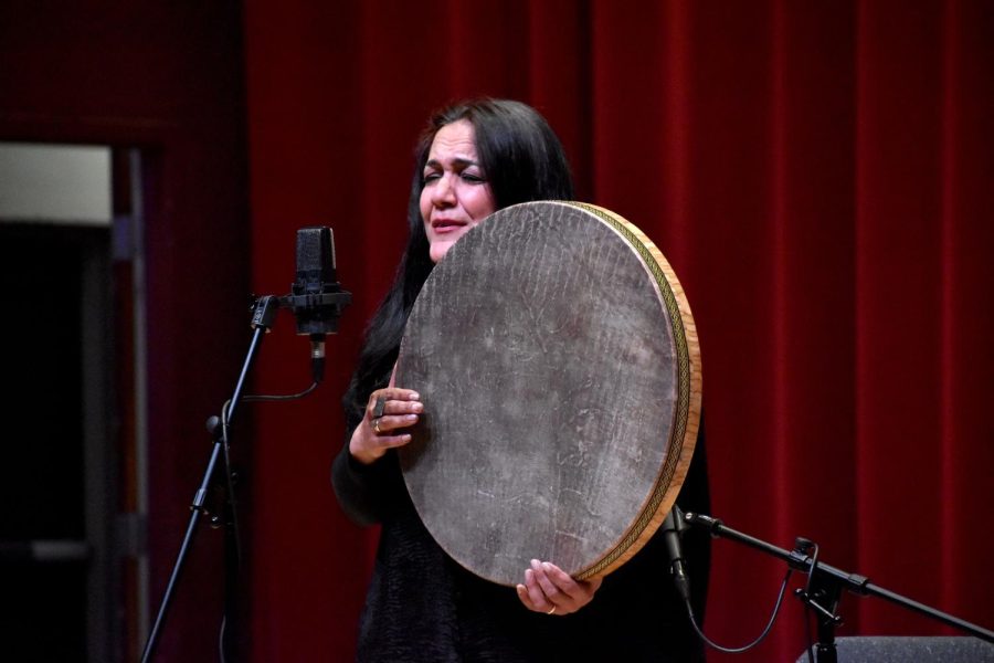 Marjan Vahdat sings in Farsi at a women’s life music tribute in Knuth Hall on International Women’s day in San Francisco CA., on March 8, 2023. (Chris Myers/ Golden Gate Xpress)