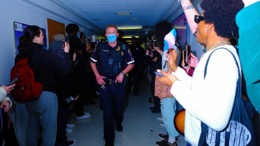 ampus police officers along with officers from SFPD walk to the room where Riley Gaines stayed after the conclusion of the event at SF State on Thursday, April 6, 2023. SFPD officers were called to assist with escorting Gaines out of the building. (Miguel Francesco Carrion / Golden Gate Xpress) 