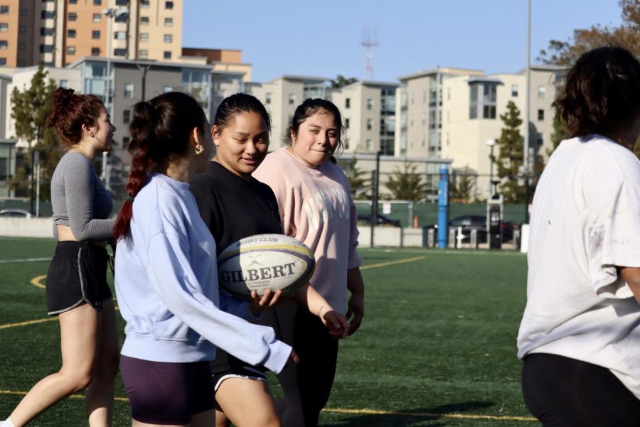 The Womens Rugby Club resumes practice from a water break at SF State’s All Purpose Field on Thursday, March 16, 2023 . (Adriana Hernandez / Golden Gate Xpress) 
