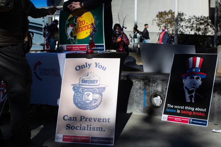 A sign reads “Only you can prevent socialism.” at a meet-and-greet for San Francisco State clubs and organizations at the SF State Quad on Monday, Jan. 30, 2023. (Benjamin Fanjoy / Golden Gate Express)