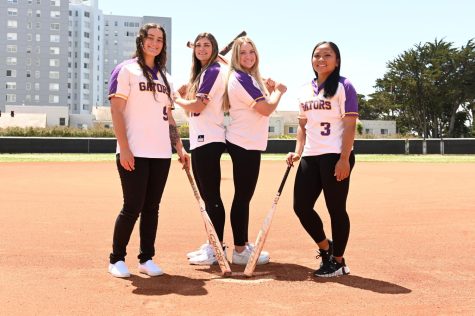 (From L-R) Gators shortstop Mia Misasi, third baseman Teya Vincent, right fielder Daniella Guerrera and second baseman Kai-Lynn DeLeon pose for a portrait at the softball field at SF State on Wednesday,
May 10, 2023. Despite having only one senior student and not making the playoffs, the Gator softball team had the eighth-most wins in program history. (Aaron Levy-Wolins/Golden Gate Xpress)
